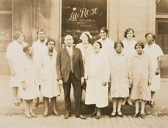 (BUSINESS.) WALKER, MADAME C.J. W. E. B. Du Bois with a group of graduates from the La Rose College and Beauty Shop in Nashville, Tenne